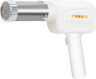 A white electric noodle maker with a silver attachment is shown against a white background.
