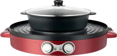 A red electric hot pot with a grill function and a glass lid is shown on a white background.