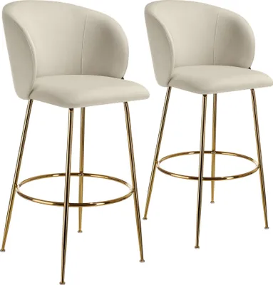 Two bar stools with cream upholstery and gold legs are shown against a white background.