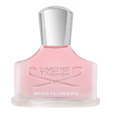 A studio shot of a Creed Wind Flowers Eau de Parfum bottle.