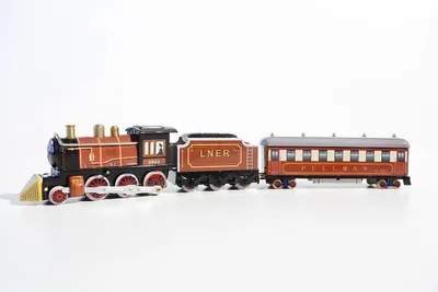 Image de Jouets en métal : locomotive à vapeur, tender (wagon de fret pour locomotive), wagon de voyageurs