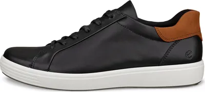 A side view of a black leather sneaker with a brown accent on the heel and a white sole.