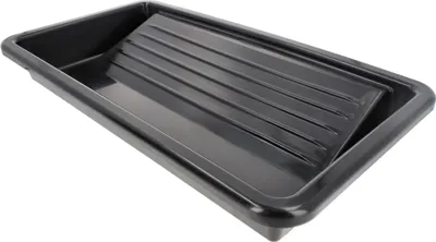 A black paint tray with ribbed texture on a white background.
