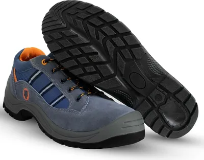 A pair of work shoes and their sole are displayed against a white background.