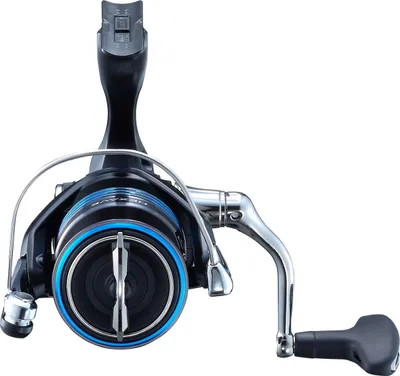 A close-up studio shot of a fishing reel against a white background.