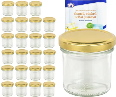 A set of glass jars with gold lids and a recipe booklet.