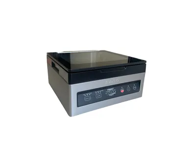 A vacuum sealer machine on a white background.
