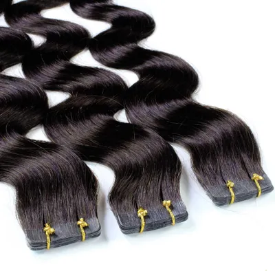 Immagine prodotto di hair2heart Tape Extensions Capelli umani ondulati - 10 strisce 2,5 g 50 cm marrone scuro