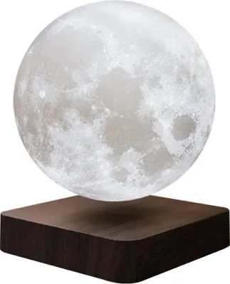 A 3D printed moon lamp levitating above a dark wooden base.