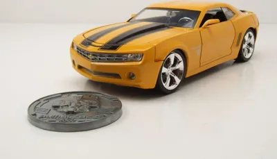 Obrázok produktu pre Jada Toys 98497 Chevrolet Camaro 2006 žltý Bumblebee Transformers s kovovým odznakom 1:24