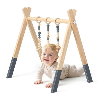Produktbild von COSTWAY Baby Gym Babyspielgeraet Spieltrapez Spielbogen Holzspielzeug Aktivitaetszentrum mit 3 Kinderspielzeugen zur Gehirnentwicklung & sensorische Stimulation, fuer Babys ueber 3 Monate Rosa