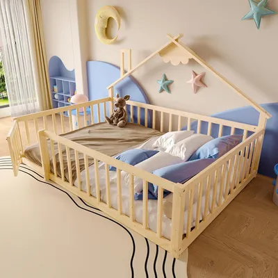 A child's bedroom with a wooden bed frame, stuffed animals, and decorative stars on the wall.