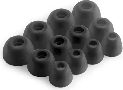 A collection of black silicone ear tips for headphones.