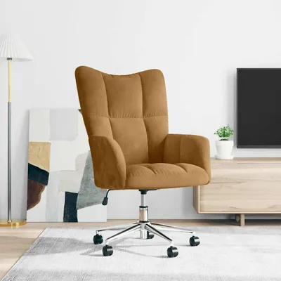A brown velvet office chair is shown in a room with a floor lamp, a painting, and a TV stand.