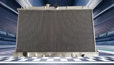 Imagen del producto de Radiador de aluminio de repuesto, incluye ventilador y tapón. Sistema de refrigeración
