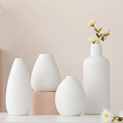 Zdjęcie produktu dla Zestaw 4 białych dekoracyjnych wazonów ceramicznych