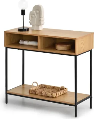 A console table with decorative items on top and a tray on the lower shelf, presented against a white background.