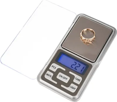 A close-up shot of a digital scale with a ring on it.