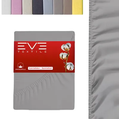 A folded grey fitted sheet with a red label showing the brand name and cotton illustration.