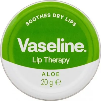 A top-down view of a Vaseline Lip Therapy balm tin.