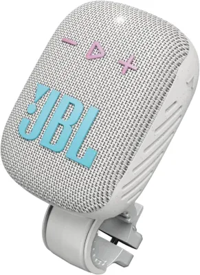 A close-up studio shot of a white JBL Wind 3S Bluetooth speaker with blue JBL logo and pink volume buttons, mounted on a grey clamp.