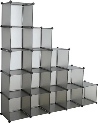 A stepped shelving unit made of translucent gray cubicles.