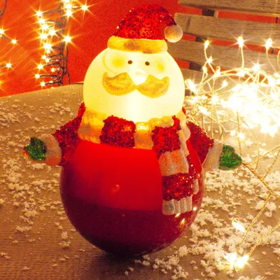 Produktbild von Acryl Weihnachtsmann mit Bewegungssensor, LED bunt, innen, batteriebetrieben