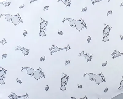 A pattern of cartoon animals on a white background.