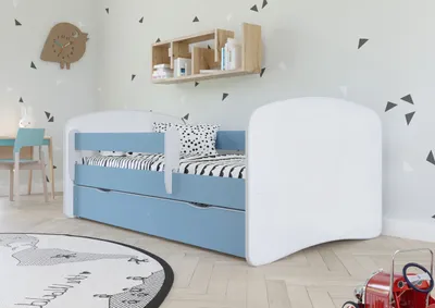 A child's bedroom with a bed and a shelf.