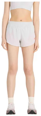 Obrázok produktu pre Šortky New Balance. Krátke nohavice New Balance RC Ultra Light, biela a oranžová farba, dámske