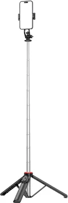 A selfie stick with a phone holder and a tripod base, fully extended.