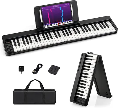 A digital piano with accessories laid out around it.