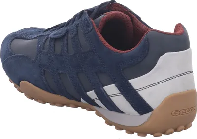 A side view of a blue Geox sneaker.