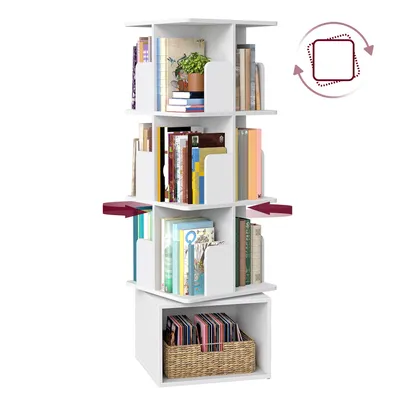 A white, rotating bookshelf with four tiers, filled with books and a basket of records at the bottom.