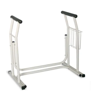 A white metal frame designed to assist with standing up from a toilet, featuring black handles and a small wire basket.