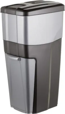 A tall, rectangular trash can with a lid and a front-opening compartment.