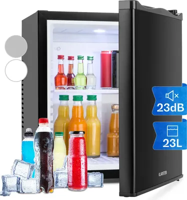 A mini refrigerator with various drinks and ice cubes in front of it.