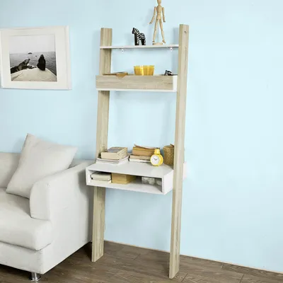 A ladder shelf with a desk component is shown next to a sofa in a room with light blue walls.