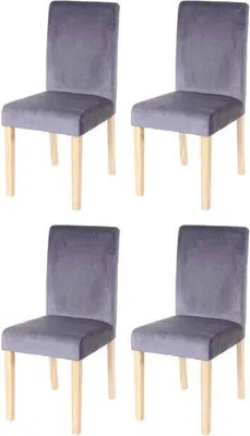 Four gray dining chairs with light wooden legs are arranged in a two-by-two grid against a white background.