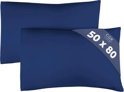 Zdjęcie produktu dla Poszewki na poduszki 50x80 cm, kolor granatowy - zestaw 2 sztuk. Poszewki wykonane z wysokiej jakości mikrofibry - miękkie i komfortowe