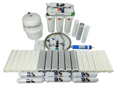A collection of water filtration components, including filters, a storage tank, and tubing, arranged on a white background.
