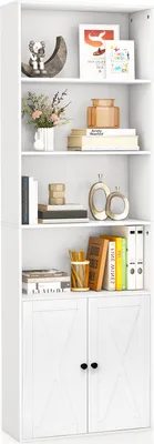 A white bookshelf with various decorative items and books on its shelves.