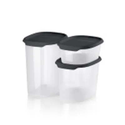 Three clear plastic food storage containers with black lids are arranged on a white background.