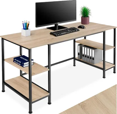 A computer desk with shelves, a monitor, keyboard, mouse, plant, and books.