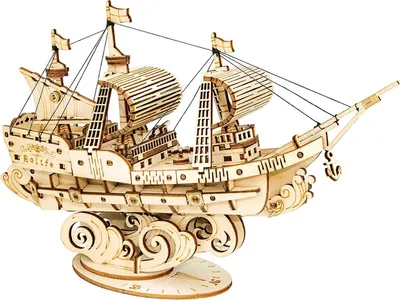 A 3D wooden model of a sailing ship on a stand.