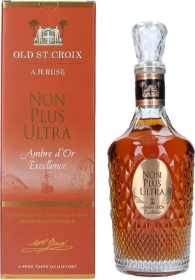 A bottle of A.H. Riise Non Plus Ultra Ambre d'Or Excellence rum and its packaging are displayed against a white background.