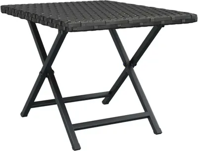 A black folding table with a woven top and metal legs, shown against a white background.