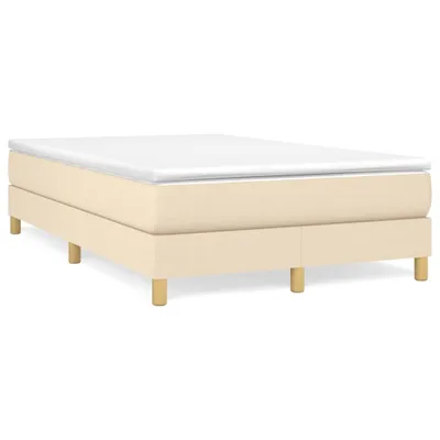 A bed frame with a mattress on top, shown from a side angle against a white background.