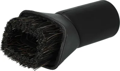 A close-up shot of a black vacuum cleaner brush attachment with bristles.