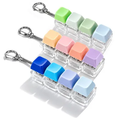 Produktbild von Tastatur Fidget Spielzeug Schlüsselanhänger - Stressabbau - Set aus 3 Stück - Kunststoff und Metall - Kompakt und leicht
